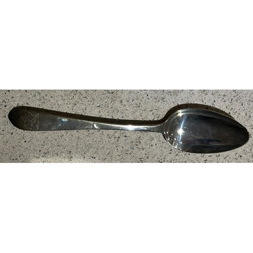 395 - An Irish Georgian silver tablespoon with engraved crest, Dublin 1813, makers mark CC, 2oz