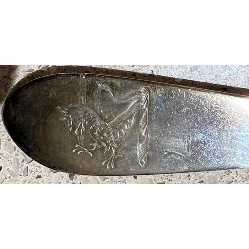 395 - An Irish Georgian silver tablespoon with engraved crest, Dublin 1813, makers mark CC, 2oz