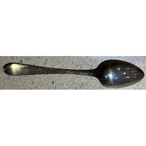 395 - An Irish Georgian silver tablespoon with engraved crest, Dublin 1813, makers mark CC, 2oz