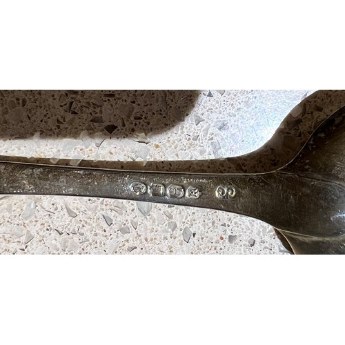 395 - An Irish Georgian silver tablespoon with engraved crest, Dublin 1813, makers mark CC, 2oz