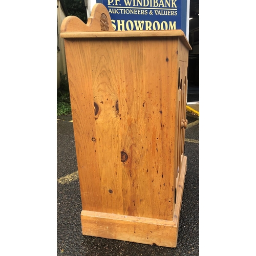 8020 - A pine low cupboard with 2 panel doors, wood knob handles, 76cm wide, 42cm deep, 82cm high. This Lot... 