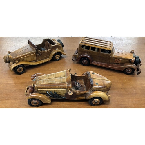 8069 - 3 model wooden cars. (3)