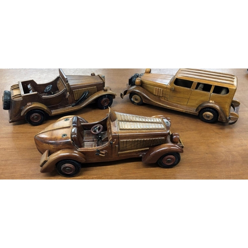 8069 - 3 model wooden cars. (3)