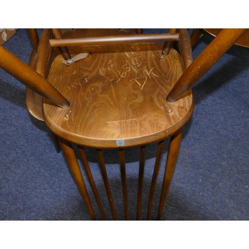 8072 - A set of 4 Ercol stick back single chairs with solid seats, all stamped and labelled