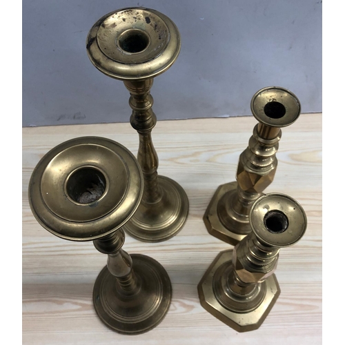 8074 - 2 pairs of brass candlesticks, 40.5cm high and 30cm high