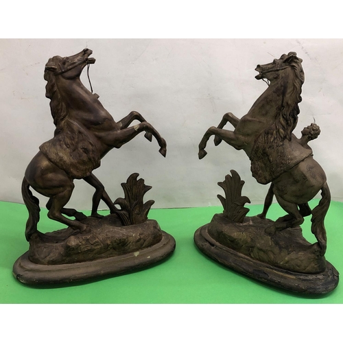 8084 - 2 spelter Marley horses on wood stands 43cm high overall