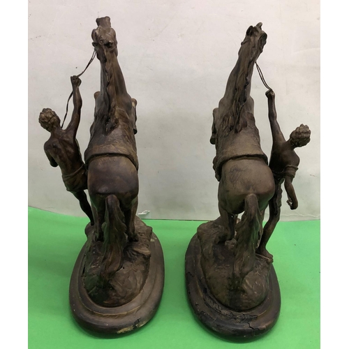 8084 - 2 spelter Marley horses on wood stands 43cm high overall