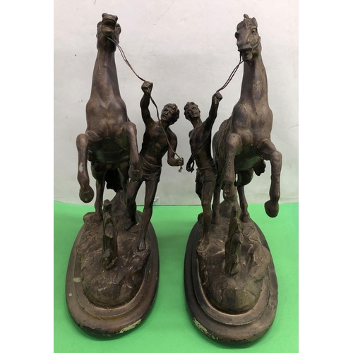 8084 - 2 spelter Marley horses on wood stands 43cm high overall