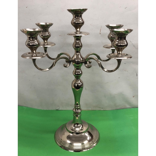 8085 - A modern 5 light 4 branch candelabra 62cm high base diameter 23.8cm.