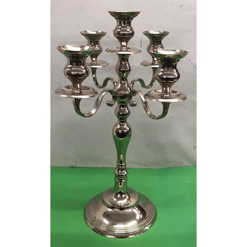 8085 - A modern 5 light 4 branch candelabra 62cm high base diameter 23.8cm.