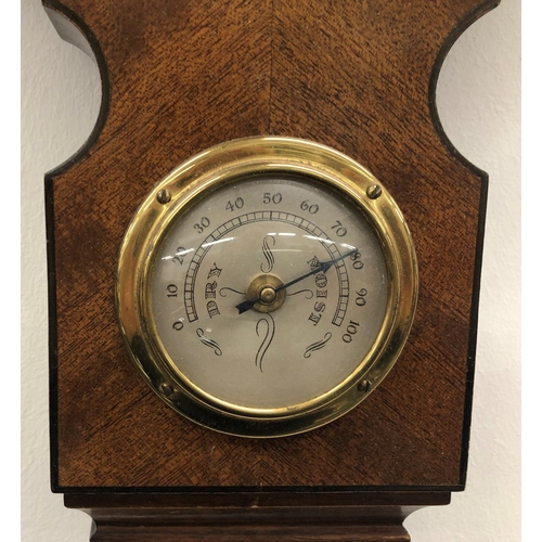 8087 - A reproduction mahogany bajo barometer (working) height 88cm.