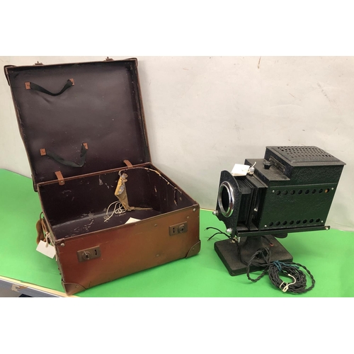 8094 - An Ensign Optiscope Magic Lantern projector Number 6 in brown leather hard case.