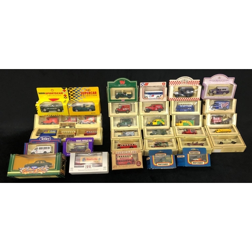 8103 - A quantity of Lledo Days Gone By model cars, Maisto and Matchbox cars, all boxed.