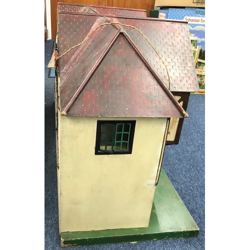 8105 - Vintage Triang Brothers  c1930's dolls house with metal framed windows, twin gabled roof and red til... 