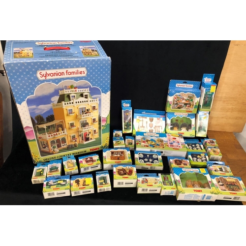 8106 - A Tomy Sylvanian Families Deluxe Country Mansion, boxed and a quantity of other boxed Sylvaninan fam... 