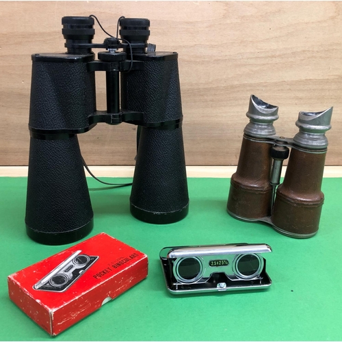 8113 - A pair of brown leather binoculars 17cm high overall, a pair of Prinz Powerview 20x60 binoculars and... 