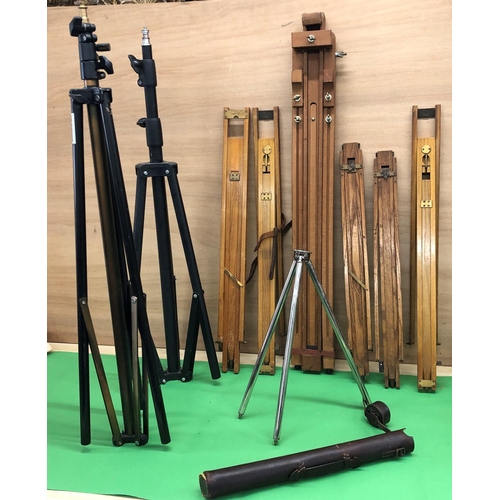 8114 - Various camera stands, easels etc, 1 in leather case.