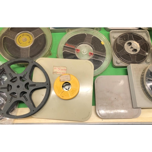 8115 - A quantity of cine reels and film.