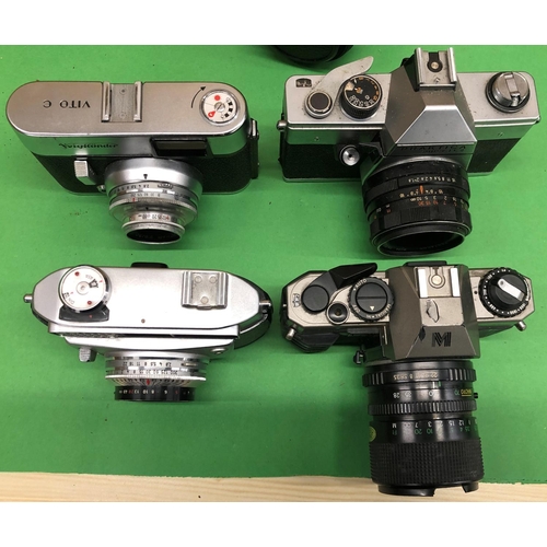 8119 - A quantity of various cameras including Praktica, Cosina, Edixa, Olympus etc. (14)