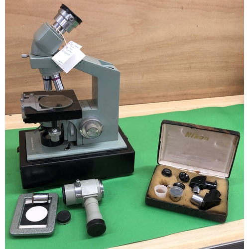 8133 - A Watson Microsystem 70 microscope with carrying box and a box with additional lenses.