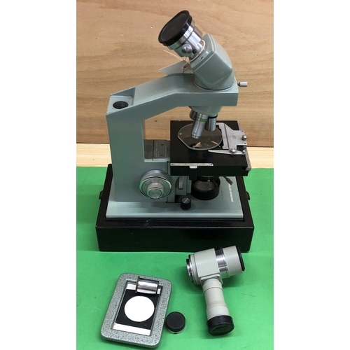 8133 - A Watson Microsystem 70 microscope with carrying box and a box with additional lenses.