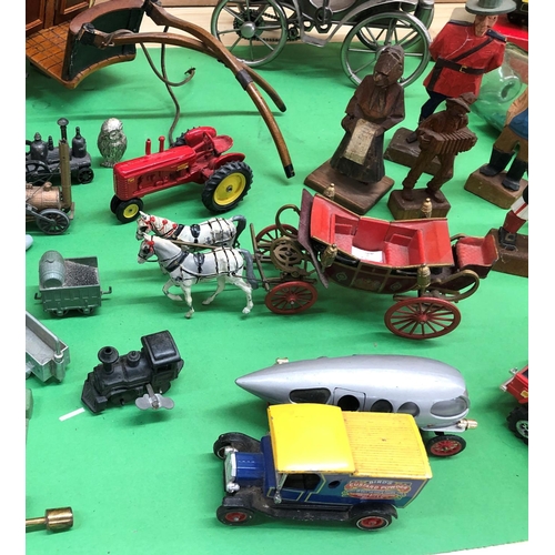 8136 - A mixed quantity of model carriages, ski lift, model soldiers, novelty pencil sharpeners etc.