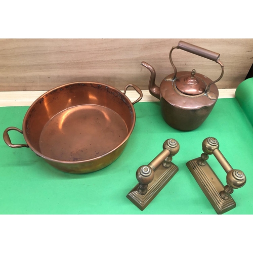 8139 - A brass pan 37.5cm diameter, brass kettle and a pair of fire dogs.