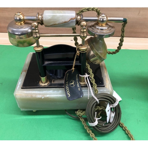 8143 - An onyx desk telephone and a Swedish Fyns Kommunale Telefonskab Fragonard TYPENT13 telephone. (2)