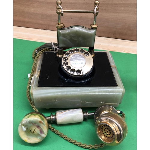 8143 - An onyx desk telephone and a Swedish Fyns Kommunale Telefonskab Fragonard TYPENT13 telephone. (2)