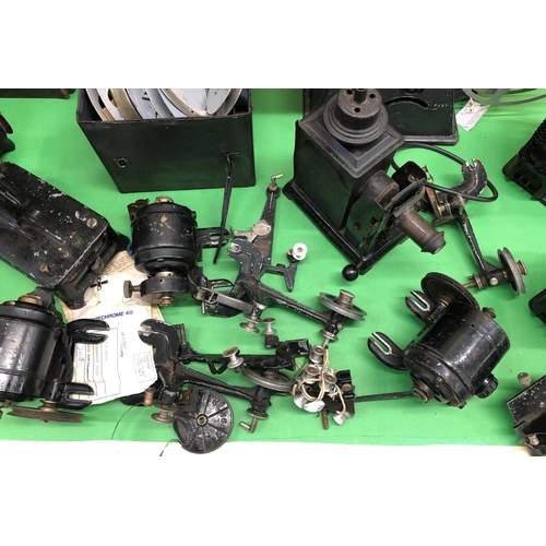 8145 - 2 Baby projectors and a quantity of related parts, transformer, resistor and film reels etc.