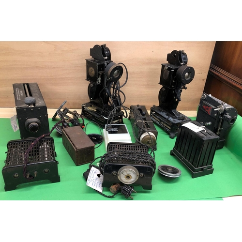 8147 - A Kodak kodascope projector, a baby projector, various other projector film reels, parts etc.