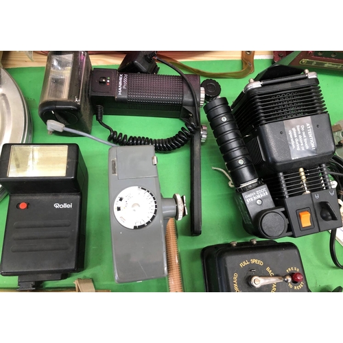 8149 - A mixed quantity of camera/film accessories, cine films, manuals, lights etc.