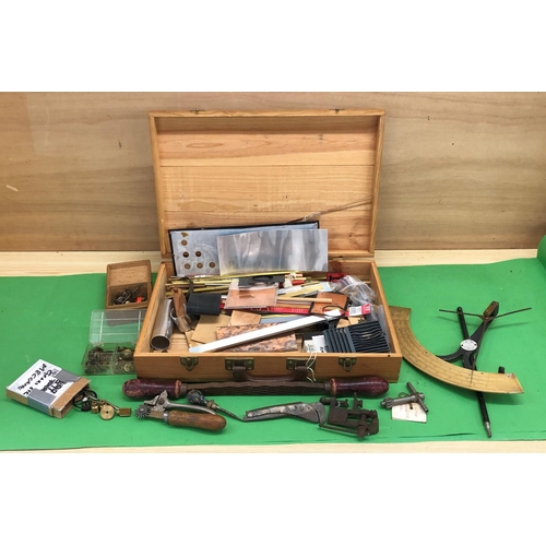 8150 - A box of camera/clock tools and parts and various other tools.