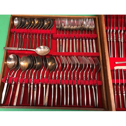 8163 - A canteen of cutlery, 12 knives, 12 steak knives, 11 small knives, 1 butter knife, 12 large forks, 1... 