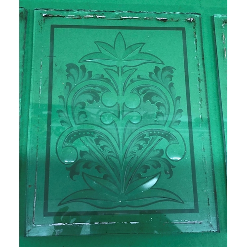 8167 - 3 heavy glass panes with etched glass floral and leaf pattern, 22 x 28.3cm.