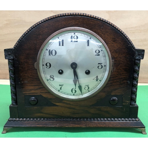 8168 - A 1920's oak 8-day striking clock, 32.5cm wide, 14cm deep, 26cm high.