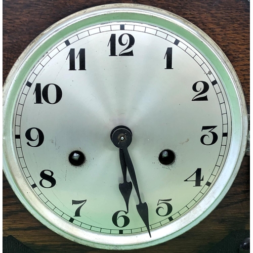 8168 - A 1920's oak 8-day striking clock, 32.5cm wide, 14cm deep, 26cm high.