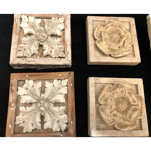 8169 - A plaster wall bracket and 7 plaster moulds.