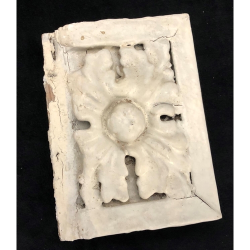 8169 - A plaster wall bracket and 7 plaster moulds.