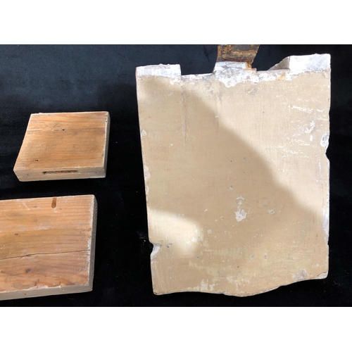 8169 - A plaster wall bracket and 7 plaster moulds.