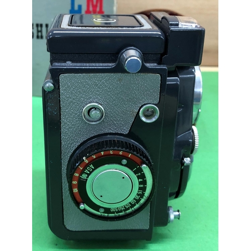 8180 - A Yashica 44 twin lens camera in leather case and with original box, a blue leather jewellery box an... 