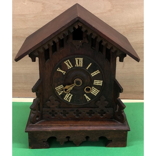 8189 - A cuckoo clock in need of restoration, 30cm high,