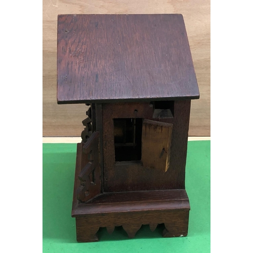 8189 - A cuckoo clock in need of restoration, 30cm high,