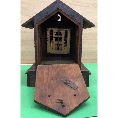 8189 - A cuckoo clock in need of restoration, 30cm high,