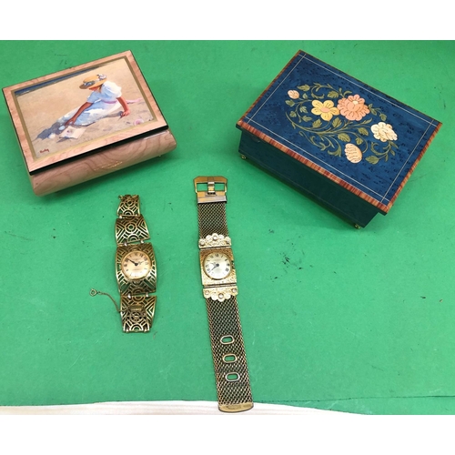 8191 - 2 Sorrentino musical jewellery boxes and 2 ladies watches.