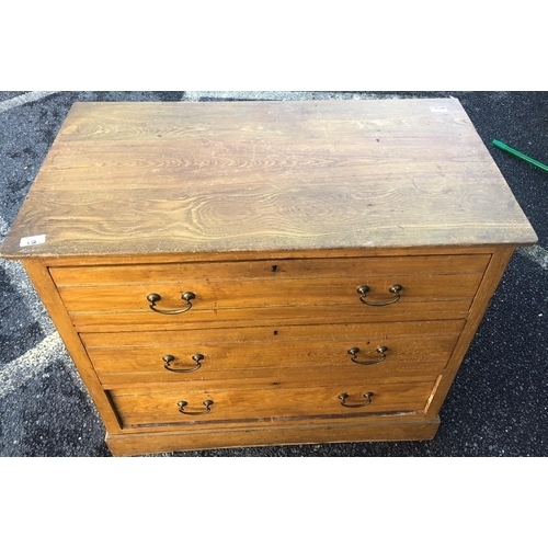 8012 - A stained pine straight front chest of drawers with 3 long drawers, drop brass handles, 91.5cm wide,... 