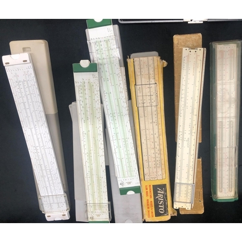 8041 - A quantity of technical drawing instruments, slide rulers, protractors etc.