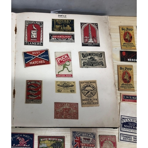 8064 - An album of match box covers and a quantity of loose matchbox covers.