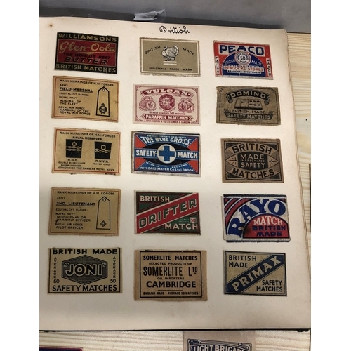 8064 - An album of match box covers and a quantity of loose matchbox covers.