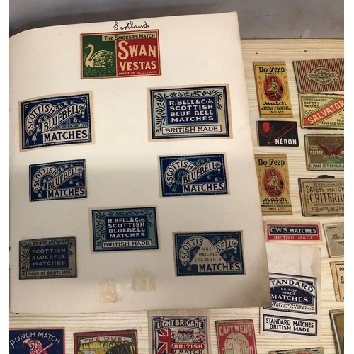 8064 - An album of match box covers and a quantity of loose matchbox covers.